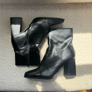 Black ankle boots with zipper detail